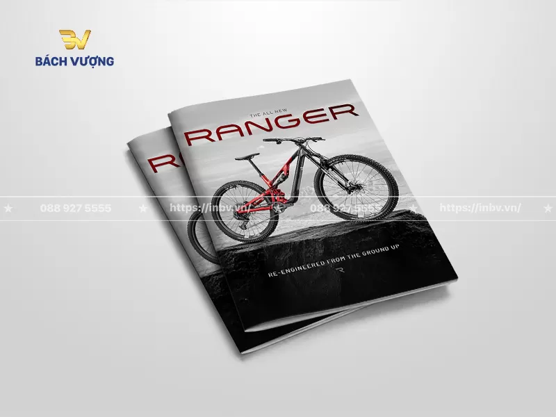 mẫu catalogue xe đạp địa h&igrave;nh nền tone đen-trắng tương phản
